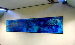 A colorful painting titled 'A Landscape of Color for Everyone' displayed in Santa Anita Metro Station, Mexico City