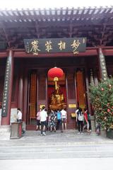 The Hall of Guanyin at the Temple of the Six Banyan Trees with traditional Chinese architecture and greenery