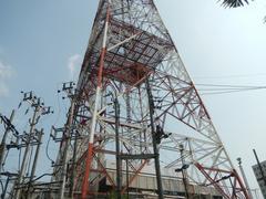 ABS-CBN Broadcasting Center and Eugenio Lopez, Jr. Communications Center along major avenues in Quezon City with ABS-CBN Millennium Transmitter tower visible