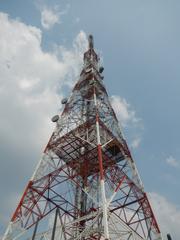 ABS-CBN Broadcasting Center and Eugenio Lopez, Jr. Communications Center buildings along Mother Ignacia Avenue and Sgt. Esguerra Avenue in South Triangle, Quezon City with Millennium Transmitter tower visible