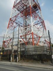 ABS-CBN Broadcasting Center and Eugenio Lopez Jr Communications Center buildings along Mother Ignacia Avenue and Sgt. Esguerra Avenue in Quezon City with Millennium Transmitter tower visible