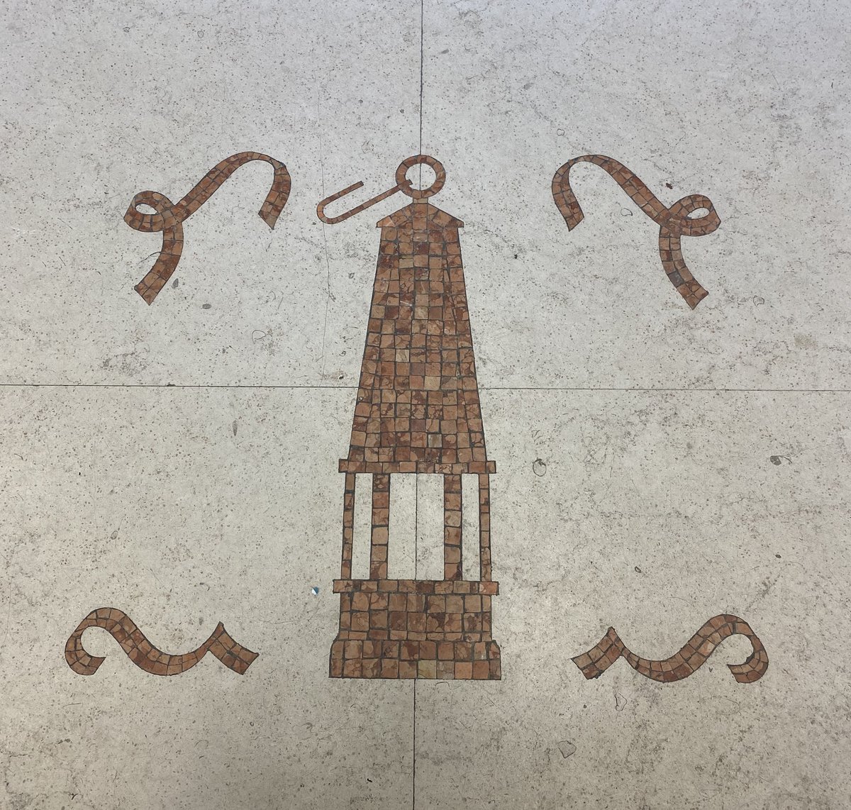 Mosaic of a miner's safety lamp symbolizing the mining industry