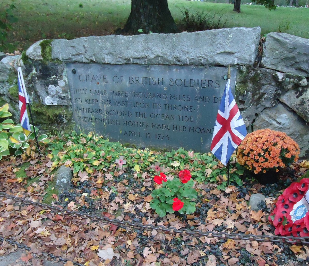 Grave marker for fallen British soldiers at Concord bridge over Concord river in Massachusetts
