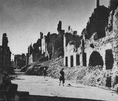 Historic view of Ulica Miodowa street in Warsaw in 1945 with damaged buildings after World War II
