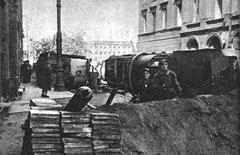 Warsaw Uprising insurgents on barricade at Miodowa Street near Krasinskich Square in August 1944