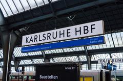 Karlsruhe Hauptbahnhof train station building with tracks and trains
