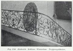 Ornate staircase railing inside Biebrich Schloss Winterbau
