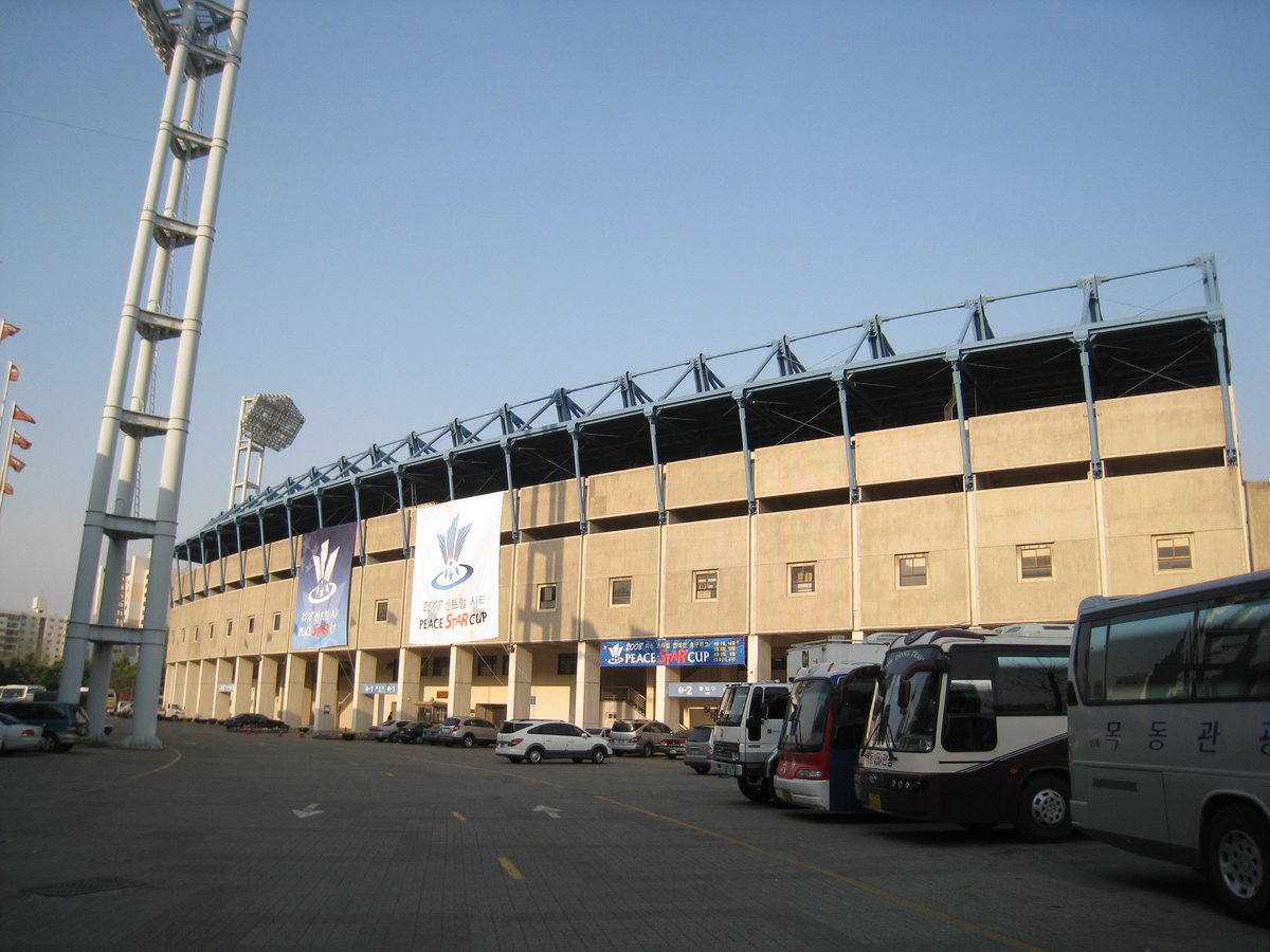 Mokdong Stadium exterior with clear blue sky