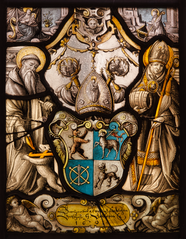 Stained-glass panel of Abbey of St. Gall quartered coat of arms with St. Gall and the bear, and St. Othmar with the legendary never-empty wine barrel