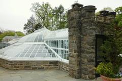 Scenic view of Morris Arboretum with lush green trees and vibrant autumn foliage in Philadelphia