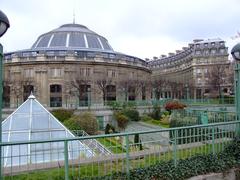 Jardin des Halles garden and Bourse de Commerce building in Paris, France