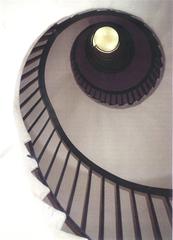 Spiral staircase with Kaiserstein steps inside Palais Esterházy in Vienna, Wallnerstraße