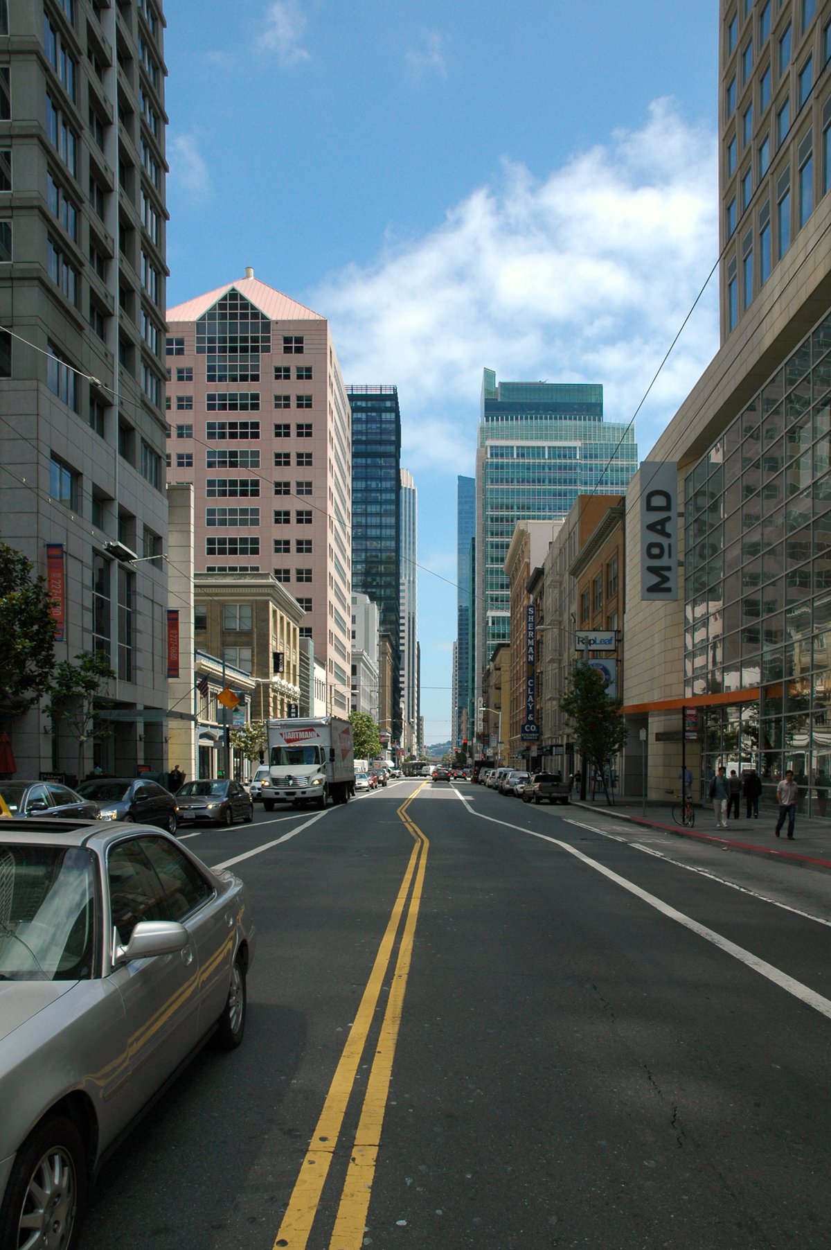 View looking down Mission Street from 3rd Street in San Francisco with city buildings and streets in 2011