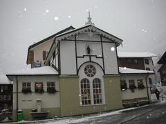 Dorfplatz square in Leukerbad with Gallerie St. Laurent building