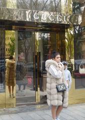 Gucci storefront on Königsallee street in Düsseldorf with luxury branding in April 2024