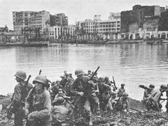 U.S. troops entering Walled City Manila during World War II