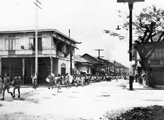 Citizens of Manila running for safety from burning suburbs during Japanese invasion