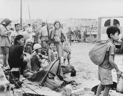 Filipino survivors liberated by U.S. troops after assault on walled city, 23 February 1945