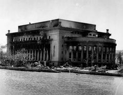 Damage to the Manila Post Office building after World War II in 1945