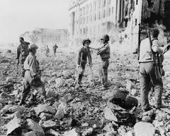 Wounded Japanese Imperial soldiers surrendering to US and Filipino troops in Manila 1945