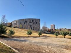 The Center for Civil and Human Rights building in Atlanta, GA with a reflective pool and modern architecture