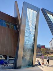 The Center for Civil and Human Rights building in Atlanta, GA with a vibrant blue sky background