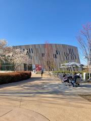 The Center for Civil and Human Rights building in Atlanta, Georgia with a bright blue sky