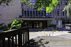 Main entrance of Guang Hua Building and motorcycle parking grids at National Taipei University of Technology