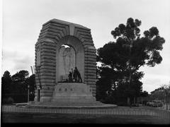 National War Memorial with North Terrace and parked automobiles