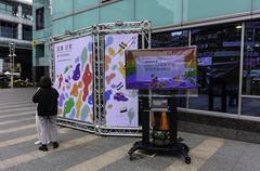 Colorful rainbow check-in wall at Taipei Metro Zhongxiao Fuxing Station Exit 2 plaza