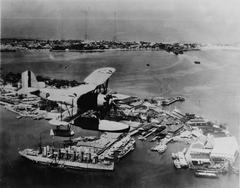 U.S. Navy Vought O2U Corsair floatplane flying over Cavite Navy Yard Philippines 1930