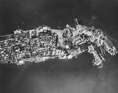 Cavite Navy Yard in the Philippines showing USS Canopus AS-9 and destroyers on 27 October 1941