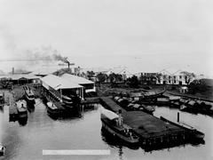 View of Cavite Navy Yard docks and ships at U.S. Naval Station Sangley Point Philippines 1899