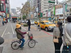 Pedestrian sidewalk in front of Dongmen MRT Station Exit 5 and Yu Chang Chinese Medical Clinic in Taipei