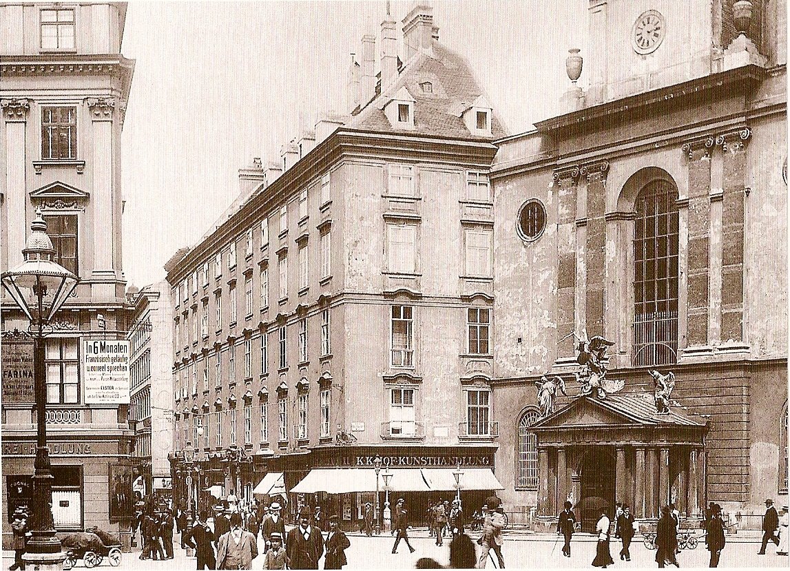 Historic view of Kohlmarkt and Michaelerplatz in Vienna in 1900 with vintage buildings and street scene