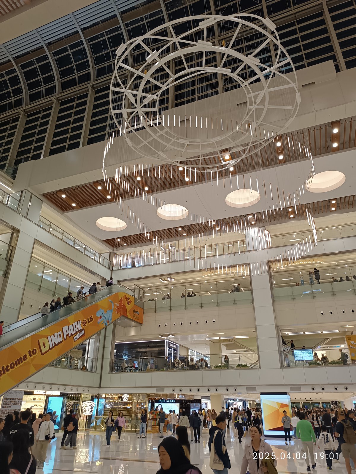 Sha Tin New Town Plaza shopping mall in Hong Kong on a clear April day in 2025
