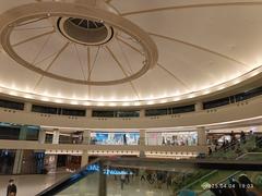 Interior view of Sha Tin New Town Plaza shopping mall in Hong Kong with spacious void area and modern design