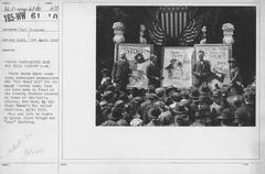 Three prominent newspaper cartoonists promoting the Third Liberty Loan in front of Liberty Theatre in April 1918