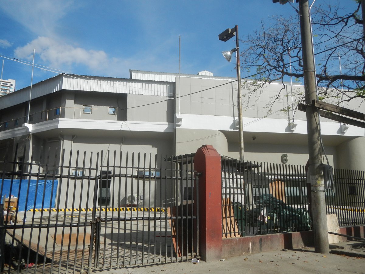 Intersection of Adriatico and Pablo Ocampo Streets in Malate, Manila featuring historic Rizal Memorial Sports Complex buildings including Coliseum, Stadium, and Philippine Sports Commission office und