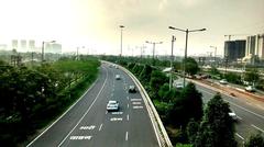 Noida-Greater Noida Expressway in Ghaziabad India with multiple lanes and vehicles