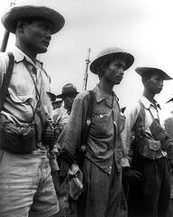 Captain Pajota's guerrillas posing at Cabanatuan during World War II