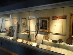 Interior of North Carolina Museum of History with military displays