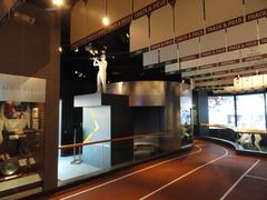Interior view of the North Carolina Museum of History showcasing the sports section with historical exhibits