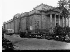 Exterior of the Art Gallery of South Australia in 1937 showing the enlarged wing with open Doric portico and entrance vestibule under construction