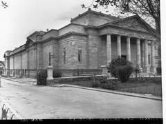 Front view of the Art Gallery of South Australia with classic columns and 'National Gallery' inscription, showing the western side of the building