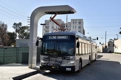 New Flyer XE60 all-electric bus charging at North Hollywood station on LA Metro G Line