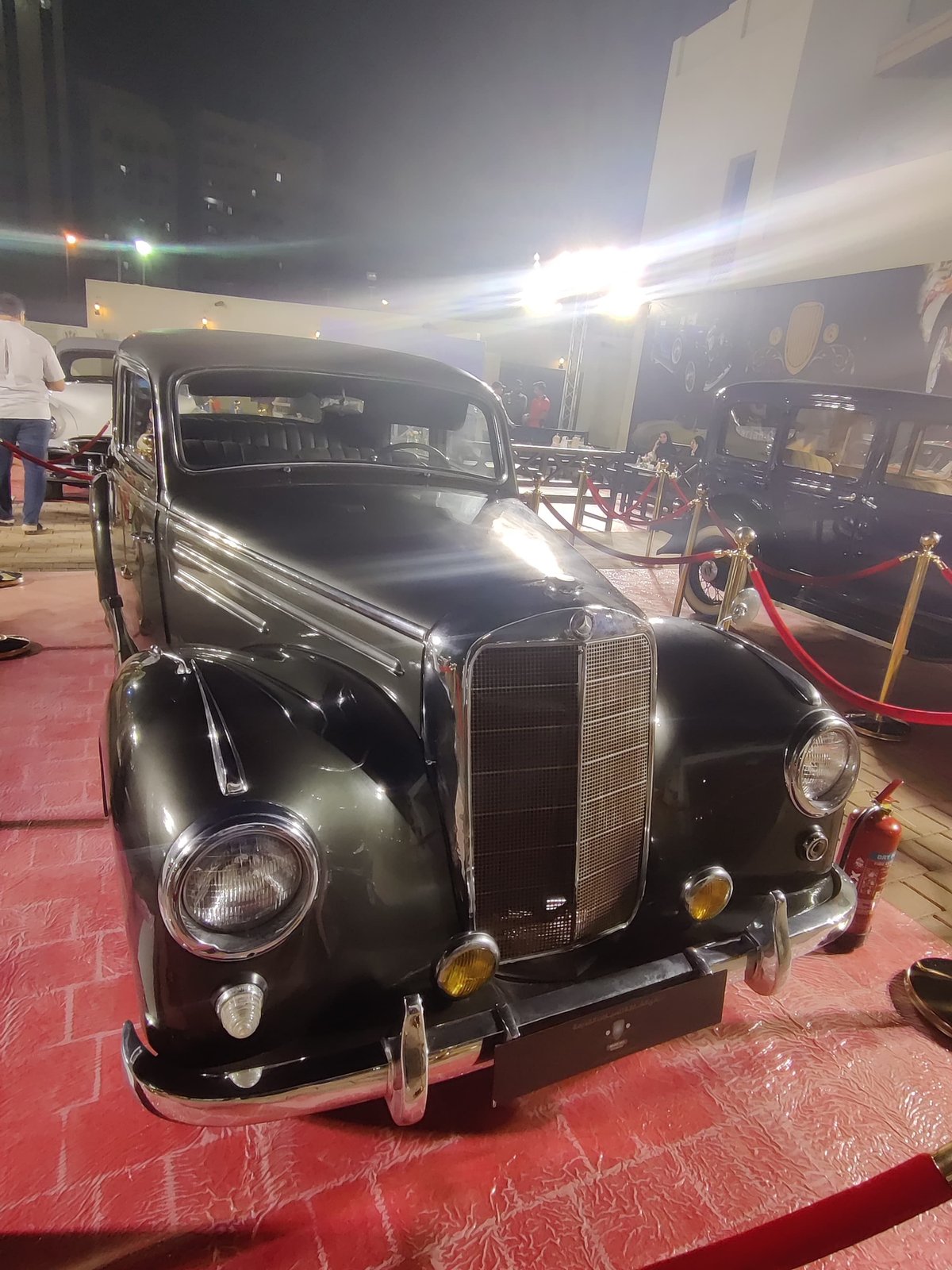 Vintage Mercedes car parked on a street