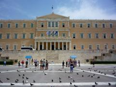 Central square of the Constitution in Athens with people and historic buildings