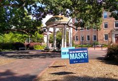 Signs near the Old Well at University of North Carolina Chapel Hill reminding students to wear masks during COVID-19 pandemic