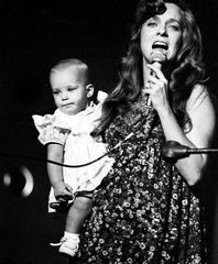 Connie Smith performing on stage at the Grand Ole Opry with her daughter